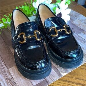 Glossy Black Loafers with Gold Accent